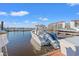 Boat featuring Yamaha engines docked at wooden pier in marina with blue skies at 4440 Nassau Ct. # D-507, Little River, SC 29566