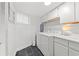 Well-equipped laundry room with modern appliances and ample counter space for folding at 4440 Nassau Ct. # D-507, Little River, SC 29566