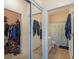 Hallway showing walk-in closet, bathroom with toilet and vanity, and another hall closet at 4503 W Harbour Ct. # S-6, Little River, SC 29566