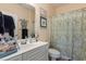 Bathroom featuring a vanity with a framed mirror, a toilet, and a shower with curtain at 4503 W Harbour Ct. # S-6, Little River, SC 29566