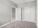 This bedroom has a closet and a doorway leading to another room in the house at 4503 W Harbour Ct. # S-6, Little River, SC 29566