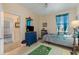 Bedroom offers ceiling fan, single bed, rug, dresser and closet at 4503 W Harbour Ct. # S-6, Little River, SC 29566
