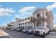 Condominium complex featuring a large parking lot and multiple floors with balconies at 4503 W Harbour Ct. # S-6, Little River, SC 29566