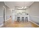 Bright kitchen features white cabinets, modern appliances, and a convenient breakfast bar with seating at 4503 W Harbour Ct. # S-6, Little River, SC 29566