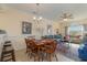 Living room featuring dining table and sofas with plenty of natural light at 4503 W Harbour Ct. # S-6, Little River, SC 29566