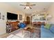 Inviting living room featuring a ceiling fan, tile floors, and an open floor plan at 4503 W Harbour Ct. # S-6, Little River, SC 29566