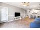 Bright living area connects to a kitchen with bar seating and exterior access at 4503 W Harbour Ct. # S-6, Little River, SC 29566