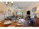 Spacious open-concept living and dining area with large windows and comfortable seating at 4503 W Harbour Ct. # S-6, Little River, SC 29566