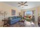 Living room featuring comfortable seating, natural light, and decorative area rug at 4503 W Harbour Ct. # S-6, Little River, SC 29566