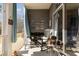 Relaxing porch area with rocking chairs, license plate art, and serene outdoor views at 4503 W Harbour Ct. # S-6, Little River, SC 29566