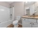Bathroom featuring a shower and bathtub combination and granite countertops at 500 Willow Greens Dr. # 500-G, Conway, SC 29526