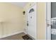Cozy entryway showcasing a charming white door with decorative hardware and a 'welcome' mat at 500 Willow Greens Dr. # 500-G, Conway, SC 29526