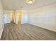 A bright bedroom with light wood flooring offers a spacious and inviting atmosphere at 5000 Windsor Green Way # 204, Myrtle Beach, SC 29579