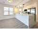 Open-concept kitchen with modern appliances, sleek countertops, and ample space for dining at 5000 Windsor Green Way # 204, Myrtle Beach, SC 29579