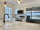 Modern kitchen featuring stainless steel appliances, stylish fixtures, and sleek quartz countertops at 5000 Windsor Green Way # 204, Myrtle Beach, SC 29579