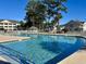 A sparkling community pool offers a refreshing retreat for residents at 5000 Windsor Green Way # 204, Myrtle Beach, SC 29579