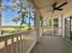 Relaxing porch with golf course views and ceiling fan at 5000 Windsor Green Way # 204, Myrtle Beach, SC 29579