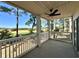 Inviting porch with golf course views and ceiling fan at 5000 Windsor Green Way # 204, Myrtle Beach, SC 29579