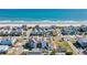 Stunning aerial view showcases beachfront homes, sandy beach, and the turquoise ocean at 512B S Ocean Blvd., Surfside Beach, SC 29575