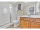 Bathroom featuring a glass enclosed shower, modern vanity, and tile flooring at 512B S Ocean Blvd., Surfside Beach, SC 29575