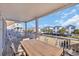Wide deck featuring an outdoor dining area with views of the neighborhood at 512B S Ocean Blvd., Surfside Beach, SC 29575