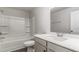 This well-lit bathroom features a tub/shower combo, single sink vanity, and modern fixtures at 515 Haven View Way, Murrells Inlet, SC 29576