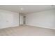 Bedroom featuring neutral carpet, closet, and access to an additional room at 515 Haven View Way, Murrells Inlet, SC 29576