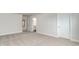 Bedroom featuring neutral carpet and access to ensuite bathroom at 515 Haven View Way, Murrells Inlet, SC 29576