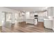 Bright kitchen features white cabinets, stainless appliances, and an island with counter seating at 515 Haven View Way, Murrells Inlet, SC 29576