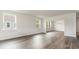 Spacious living room featuring hardwood floors, ample natural light, and an open floor plan at 515 Haven View Way, Murrells Inlet, SC 29576