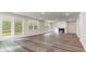 Spacious living room with fireplace, sliding glass doors, and ample natural light at 515 Haven View Way, Murrells Inlet, SC 29576