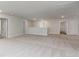 Spacious loft area with neutral carpeting, ample lighting, and access to multiple rooms at 515 Haven View Way, Murrells Inlet, SC 29576