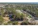 An aerial view of a community surrounded by lush greenery, offering a serene living environment at 55 Porch Ln., Pawleys Island, SC 29585