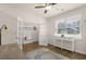 Bright, versatile room with hardwood floors, built in hall-tree, ceiling fan, and ample sunlight at 55 Porch Ln., Pawleys Island, SC 29585