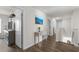 Upstairs hallway with art display and view towards the bedrooms at 55 Porch Ln., Pawleys Island, SC 29585