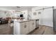Kitchen featuring a large island, stainless steel dishwasher, and an open floor plan at 55 Porch Ln., Pawleys Island, SC 29585