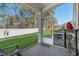Relaxing screened-in patio with views of the backyard and mature trees at 55 Porch Ln., Pawleys Island, SC 29585