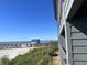 Enjoy the beautiful view of the beach from the building's balcony at 6000 N Ocean Blvd. # 122, North Myrtle Beach, SC 29582