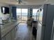Comfortable living area and view of the beach at 6000 N Ocean Blvd. # 122, North Myrtle Beach, SC 29582