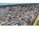 Aerial view of a charming neighborhood showcasing multiple beach houses near the water at 6001 - 8008 S Kings Hwy., Myrtle Beach, SC 29575