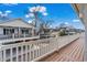 Expansive deck offering neighborhood views, perfect for outdoor relaxation and entertaining at 6001 - 8008 S Kings Hwy., Myrtle Beach, SC 29575