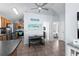 The open-concept kitchen features stainless steel appliances, ample counter space, and a casual dining area at 6001 - 8008 S Kings Hwy., Myrtle Beach, SC 29575