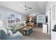 Inviting living room boasts lots of natural light and coastal decor with open floor plan to the kitchen at 6001 - 8008 S Kings Hwy., Myrtle Beach, SC 29575