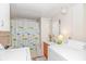 Compact bathroom with a tub, shower, vanity, and laundry area at 6001-Mh206 S Kings Hwy., Myrtle Beach, SC 29575