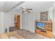 Inviting living room with neutral tones, entertainment center, and access to the bathroom at 6001-Mh206 S Kings Hwy., Myrtle Beach, SC 29575