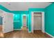 Bedroom with ensuite, featuring neutral walls, fan, and closet space at 614 Cavandish Dr., Myrtle Beach, SC 29588