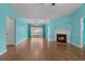 Inviting living room featuring a fireplace, hardwood floors, and natural light at 614 Cavandish Dr., Myrtle Beach, SC 29588