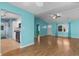 Open-concept living area with view to kitchen, hardwood floors, and natural light at 614 Cavandish Dr., Myrtle Beach, SC 29588