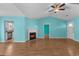 Open-concept living room with a fireplace and views of the kitchen area at 614 Cavandish Dr., Myrtle Beach, SC 29588