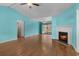 Bright living room with a fireplace, hardwood floors, and ample space at 614 Cavandish Dr., Myrtle Beach, SC 29588